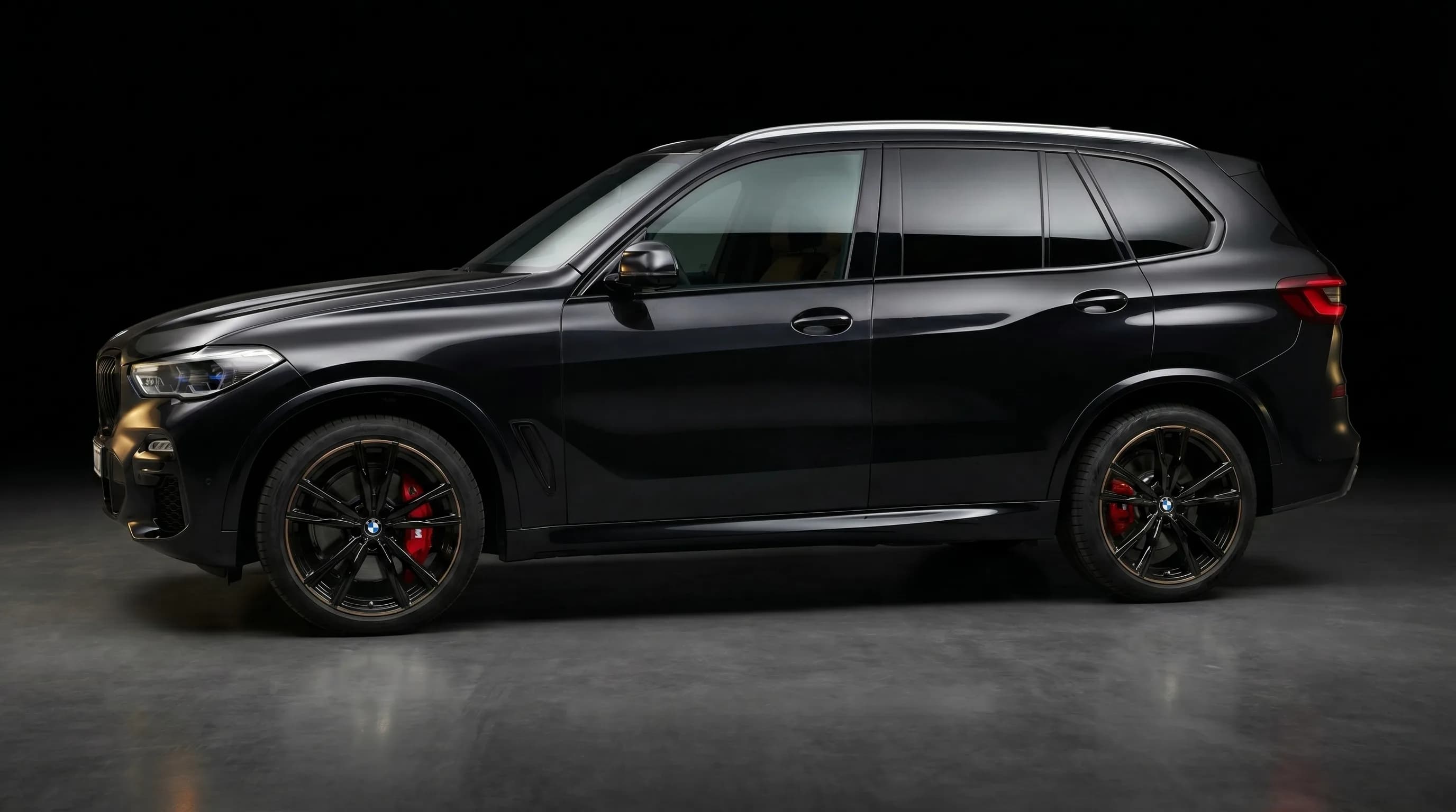 Тот же BMW X5 после покраски двери, дисков и суппортов